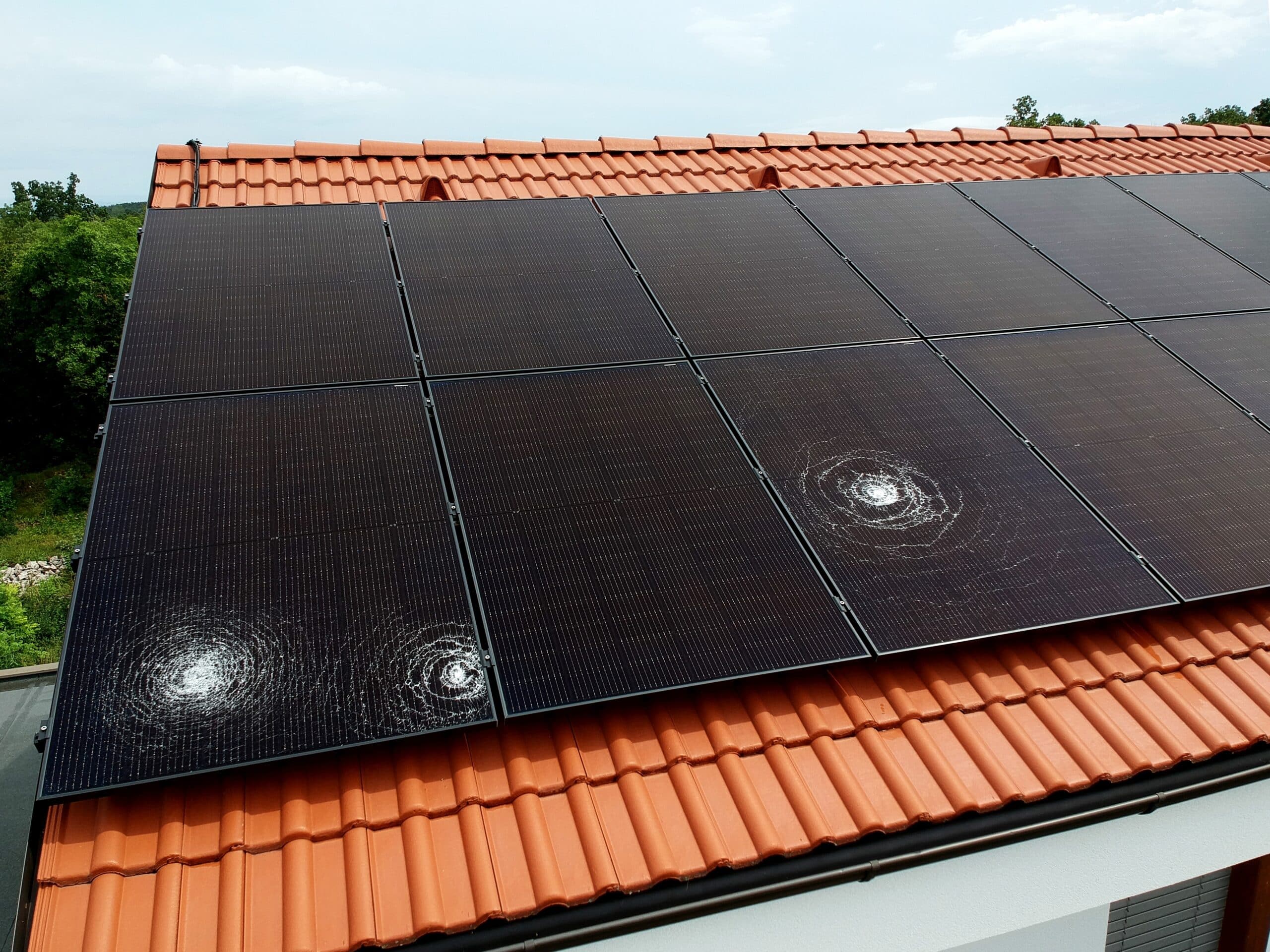 Three,Big,Dents,From,Hail,On,A,New,Solar,Power